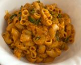 A picture of step 14 of Creamy Cheesy Schezwan Pasta.