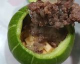 Foto del paso 4 de la receta: Zapallitos al horno rellenos de chorizo y cebolla