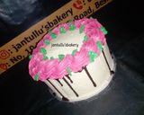 A picture of step 7 of Drips buttercream icing cake.
