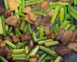 A picture of step 5 of Stir-Fried Garlic Scapes with Pork Belly.