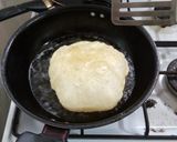 A picture of step 7 of Phulko Luchi/ Luchi in Bengali style.