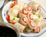 A picture of step 4 of Salmon roll with pickles thin-sliced turnips.