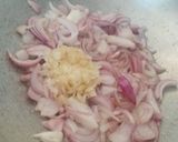 A picture of step 2 of Ola rotla ll baingan ka bharta or bajre ki roti.