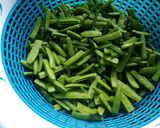 A picture of step 1 of Guwar (cluster beans) Do Pyaza.