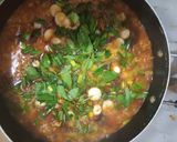 A picture of step 6 of Palm oil rice native jollof rice.