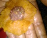 A picture of step 4 of Biscuits modak with tutifruti filling.