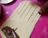 A picture of step 8 of Nutella stuffed caterpillar buns.