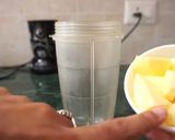 A picture of step 1 of Mango & lemon punch.