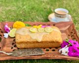 A picture of step 13 of Mango Loaf Cake with lime glaze.