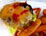 A picture of step 5 of My Chilli Burger with lots of toppings 😘.