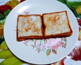 A picture of step 3 of Amul cheese spread vegetable sandwich.