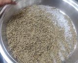 A picture of step 1 of Rajasthani Bajra Khichda (pearl millet).