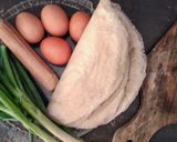 A picture of step 1 of Egg and Sausage Fritters.