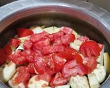 A picture of step 2 of Bengan aloo (eggplant with potatoes).