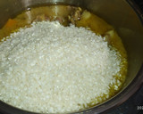 Foto del paso 7 de la receta: Arroz con cerdo, zanahoria y papa