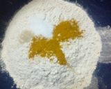 A picture of step 1 of Turmeric coconut mandazis.