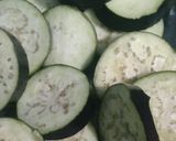 A picture of step 1 of Baingan Bhaja (Bengali Eggplant Fritters).
