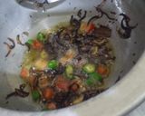A picture of step 1 of Chicken pulao.