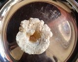 A picture of step 4 of Malai kofta in white gravy.