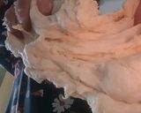A picture of step 4 of White chapati (oiled thrice and rolled out twice).