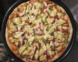 A picture of step 10 of Chicken Pizza.