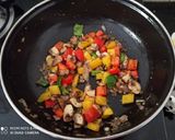 A picture of step 2 of Macaroni in Mushroom and bell pepper sauce.