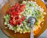 Une image de l'étape 11 de Salade de riz aux deux tomates, concombre et coriandre.