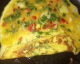 A picture of step 4 of Omelette egg roll.