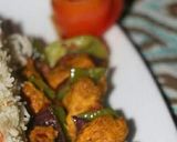 A picture of step 4 of Egg fried rice with chicken shahlik sticks.