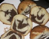 A picture of step 4 of Zebra cup cakes.