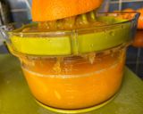 A picture of step 1 of My mum’s refreshing orange juice with lemon 🍋 🍊.