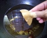 A picture of step 4 of Baingan k pakorey.