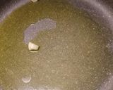 A picture of step 2 of Mussels in white wine sauce.