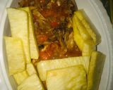 A picture of step 3 of Yam with chicken sauce.