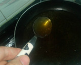 Foto del paso 3 de la receta: Piruletas de pollo corn flakes con reducción de cerveza y miel