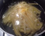 A picture of step 3 of Tagliatelle with Salamella Ragù, Pioppini Mushrooms, and Walnuts.