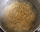 A picture of step 3 of Indomie pizza.