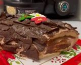 Foto del paso 12 de la receta: Tronco de Navidad 🎄🎁 relleno de nata y praliné de avellanas y chocolate sin lactosa