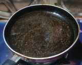 A picture of step 3 of Saunth or imli chutney(from leftover gulab jamun syrup).