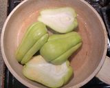 A picture of step 1 of Stuffed Chayotes with White Rice and Mushroom Sauce.
