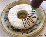 A picture of step 9 of Christmas Wreath Cake.