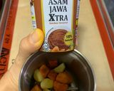 A picture of step 1 of Jamu Kunyit Asam - Turmeric Tamarind Tonic Drink.