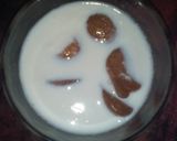 A picture of step 32 of Aloo fulcopi katla rosha ar misti doi.