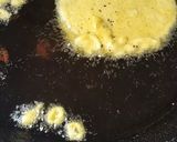 A picture of step 5 of Begun bhaja.