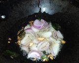 A picture of step 4 of Bharwa Masala baingan.
