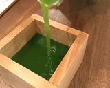 A picture of step 1 of Matcha Green Tea Sake.