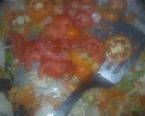 A picture of step 4 of Patira with egg sauce.