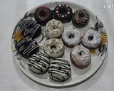 A picture of step 11 of Eggless Easy Doughnut Recipe.