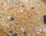 Foto del paso 5 de la receta: Arroz caldoso con chipirones y gambones