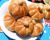 A picture of step 14 of Pumpkin shaped dinner rolls.